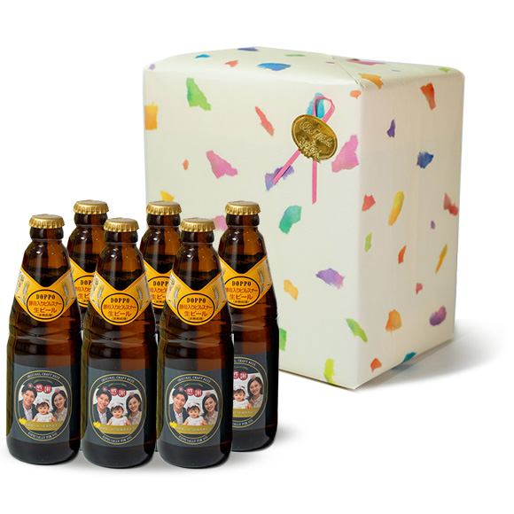 高級感あふれる紙製の化粧箱に入れて包装紙でラッピングするお得なスナップビール2本用ギフトラッピング