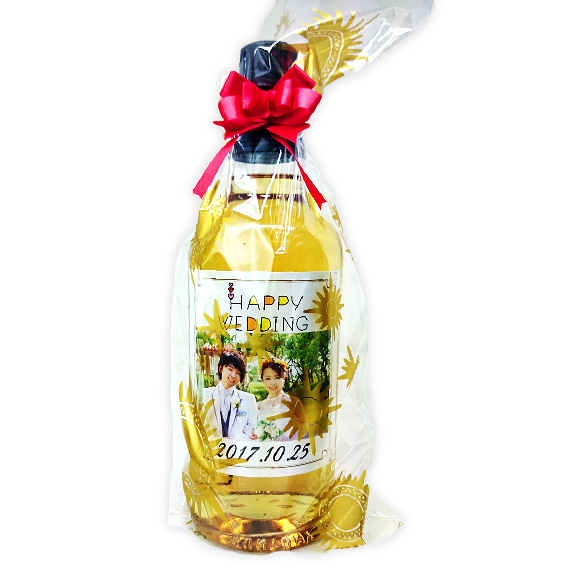 スナップウイスキーのボトルフィルムとリボンによる無料ギフトラッピング